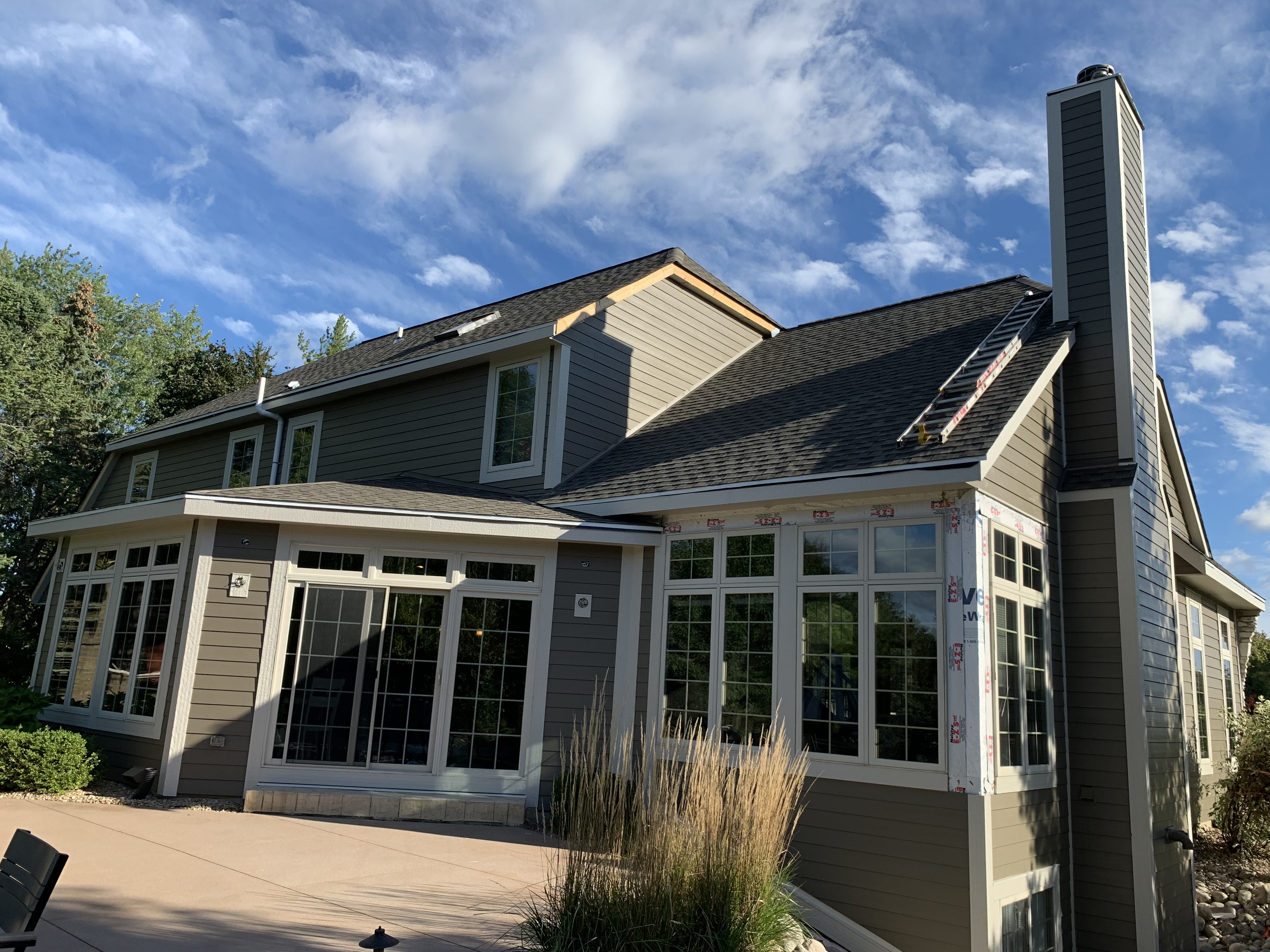 Siding and sunroom exterior